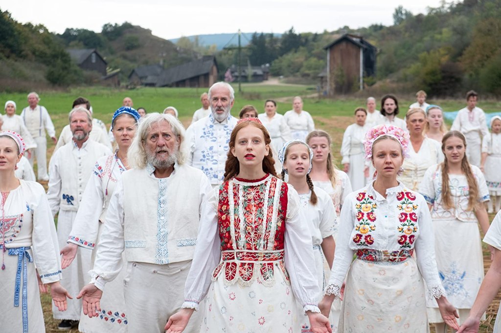 midsommar colony community preparing for the final ceremony of burning when dani as may queen chooses who is sacrificed 